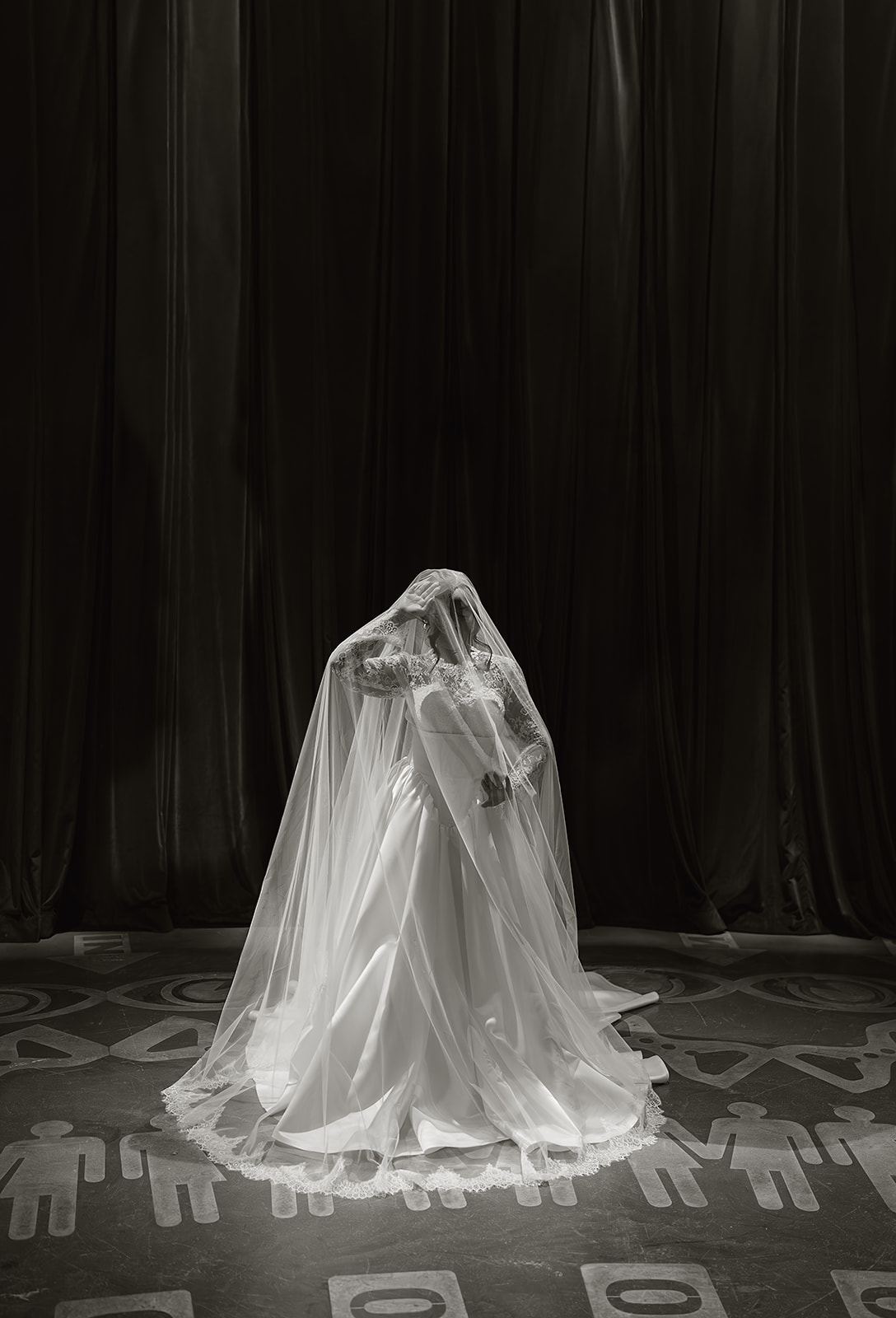 Editorial bridal portrait of a bride in a flowing veil photographed in a fine art style in Oklahoma City